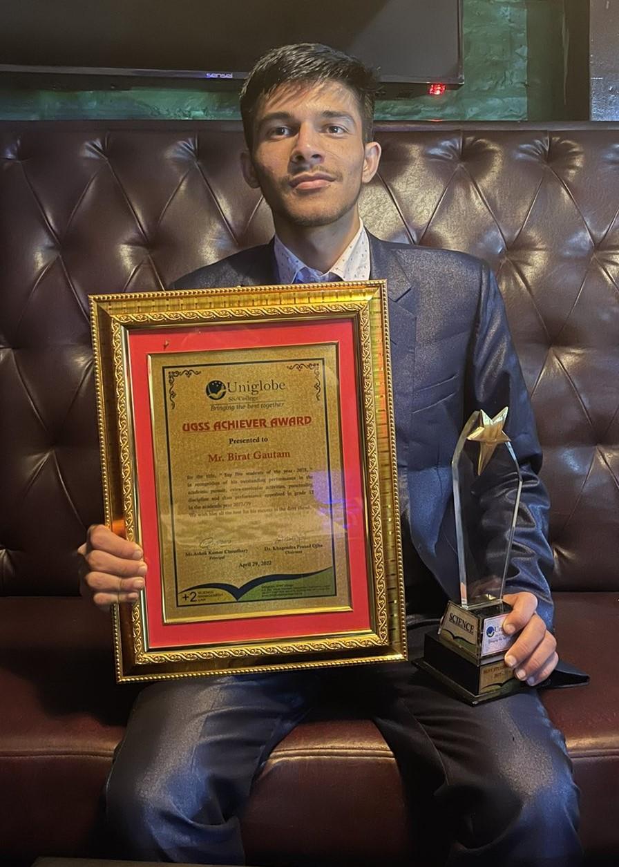 Birat Gautam receiving UGSS Student of the Year Award 2022